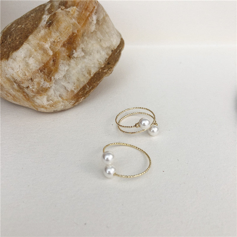 Pearl Swan Rings