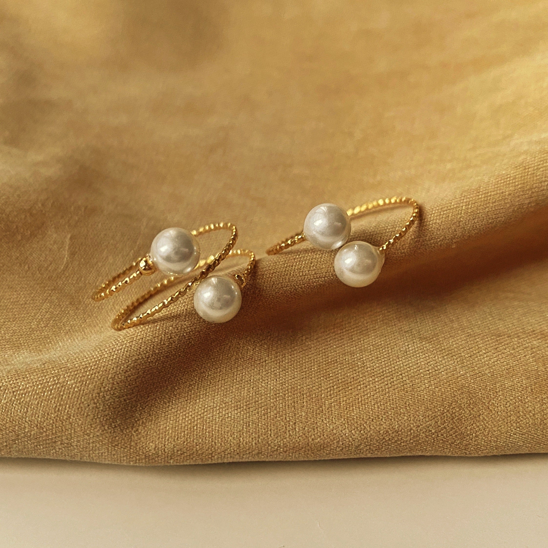 Pearl Swan Rings