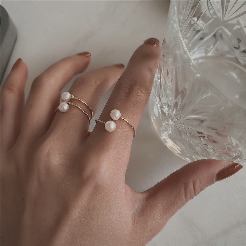 Pearl Swan Rings